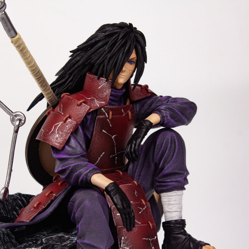 Naruto sitting pose-spotted Uchiha Madara
