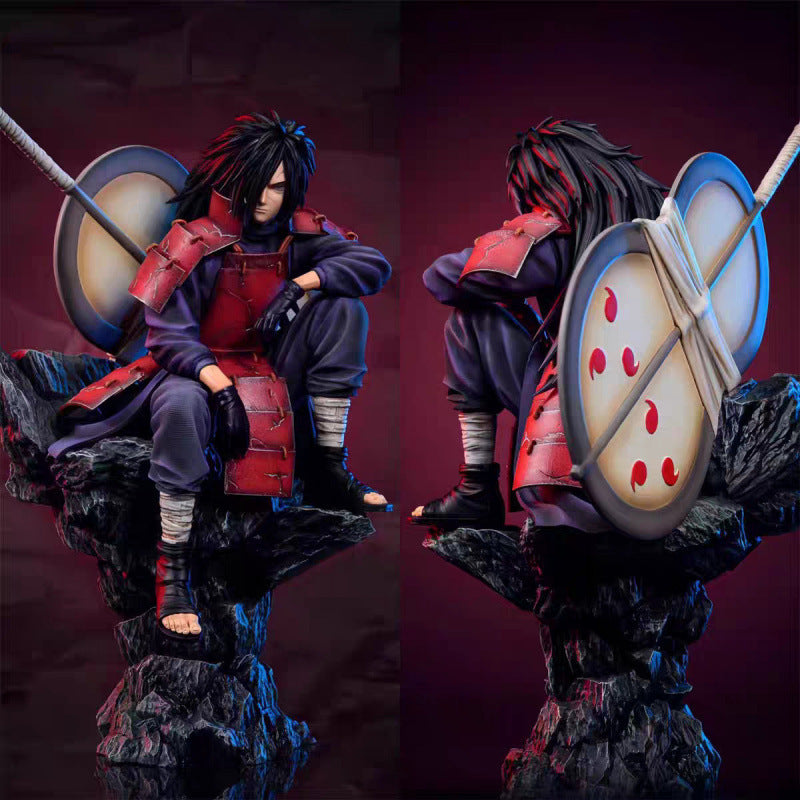 Naruto sitting pose-spotted Uchiha Madara