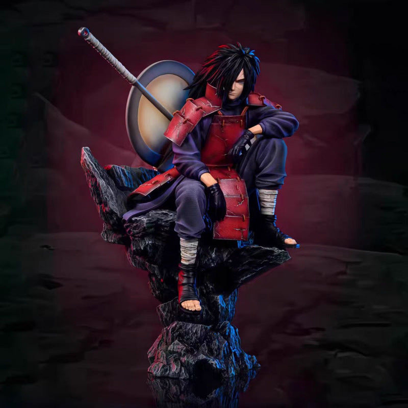 Naruto sitting pose-spotted Uchiha Madara