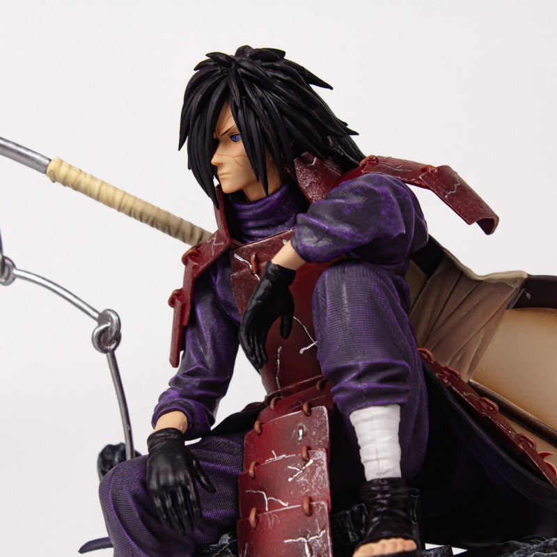 Naruto sitting pose-spotted Uchiha Madara