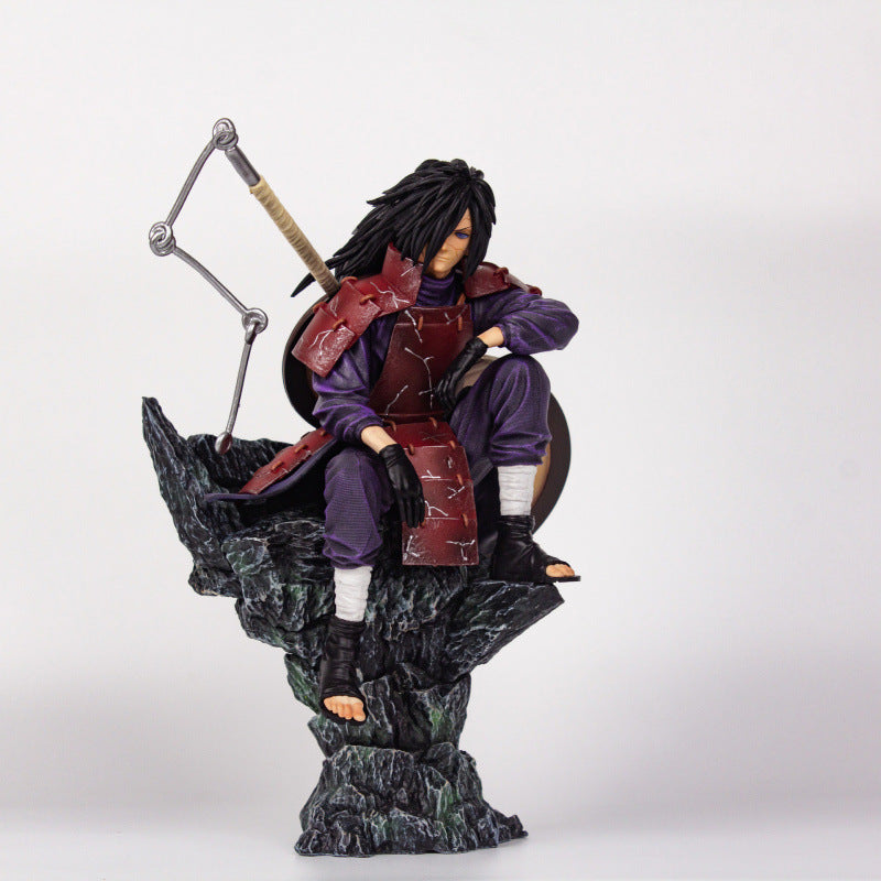 Naruto sitting pose-spotted Uchiha Madara